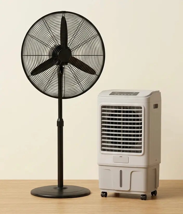 Abou Che3le standing electric fan and portable air cooler side-by-side on a wooden surface.
