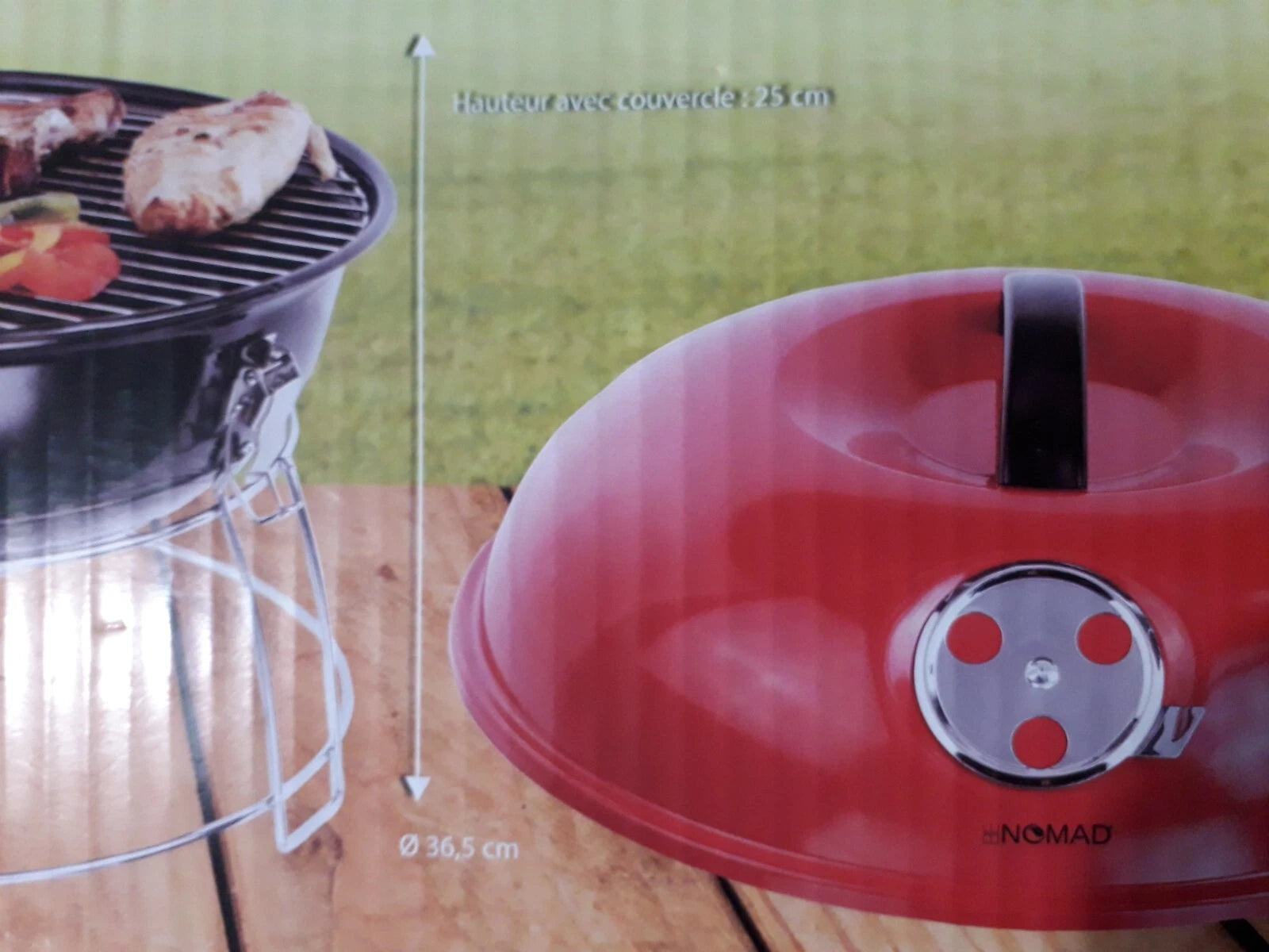 Red kettle-style grill lid with a black handle and silver control dial, shown on a wooden surface with part of a black grill and outdoor grass visible in the background. Measurement arrows and text indicate dimensions.
Be Nomad Portable Tabletop Charcoal BBQ Grill for 4 persons