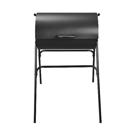 GRILLMEISTER Kansas Charcoal Barrel BBQ Grill with a hinged lid and four legs, shown from a front-facing perspective on a solid white background.