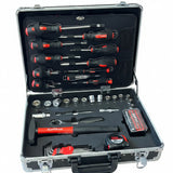 A comprehensive screwdriver and socket wrench set organized inside an open silver aluminum carrying case on a wooden floor. The tools feature black and red handles, with the brand name 'Craftsman' visible on several pieces.